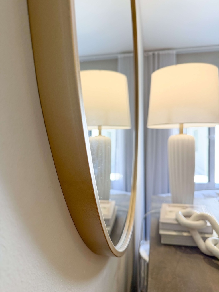 Espejo redondo dorado de metal