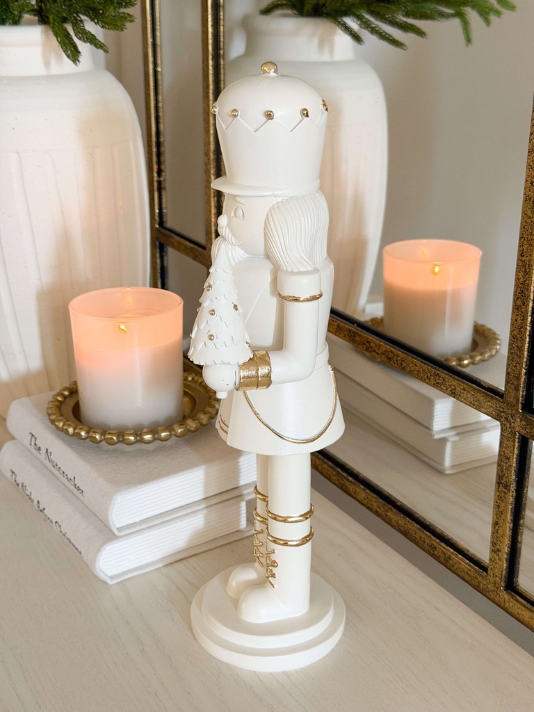 Nutcracker blanco con detalles dorados