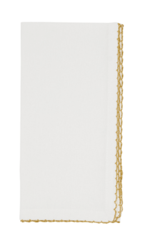 Servilleta blanca orilla dorada