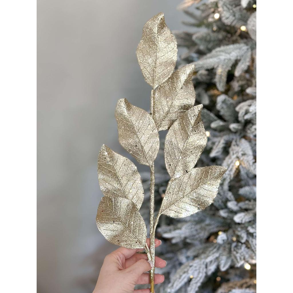 Rama hoja de magnolia dorada escarchada