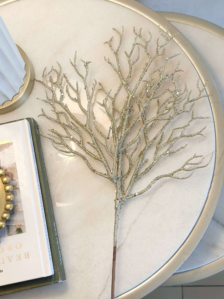 Rama coral dorada escarchada