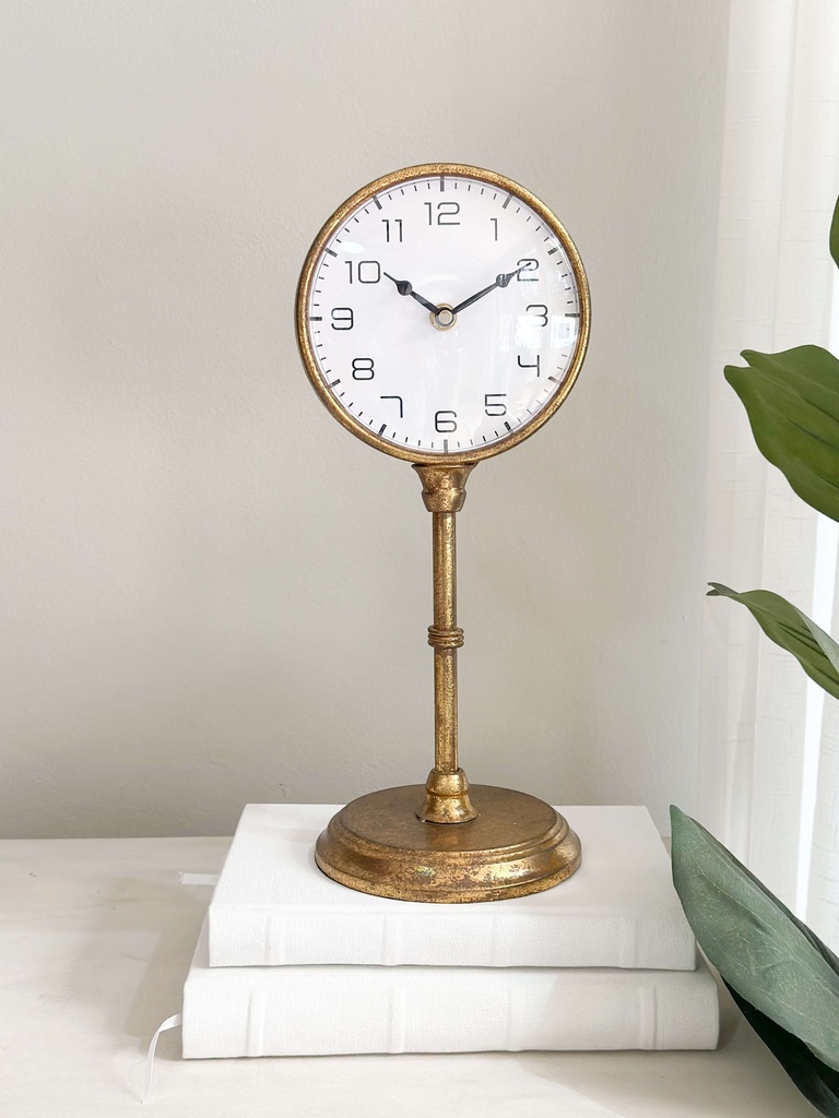Reloj dorado de mesa